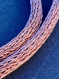 "🌟 Copper Coil of the Cunning Rogue 🌟 Embrace your inner adventurer with our meticulously handcrafted Viking Knit Chain. The Copper Coil of the Cunning Rogue pays homage to craftsmanship and sly spirit. Each chain is made out of pure copper using a double knit pattern and thoughtfully woven to order, allowing you to select your preferred length, ranging from a nimble 8 inches to an awe-inspiring 30 inches. 🗡️ Stats 🗡️ 8-15 inches: +5 Dexterity, +2 Guile, Rogue's Wit - Crafty maneuvers for a sly rogue. 16-22 inches: +8 Dexterity, +3 Guile, Master Infiltrator - Ideal for stealthy adventures. 23-30 inches: +10 Dexterity, +4 Guile, Shadowlord's Whispers - A touch of intrigue, like a shadowy rogue. Whether you're a cunning pickpocket or a skilled infiltrator, the \"Copper Coil of the Cunnin Viking Weave Bracelet, Viking Knit Jewelry, Wire Wrap Necklace, Copper Uses, Chainmail Bracelet, Knitted Wire, Weaving Tutorial, Viking Knit, Historical Jewellery