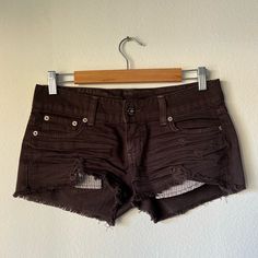 Carmar Denim Short Shorts Purchased From Lf Store. Dark Brown Color. Size 27. Peekaboo Pockets. Wrinkles And Tears Are Part Of The Design. Never Worn. Approx Lay Flat Measurements: Front: 8” Side: 9” Back: 11” Waist: 16” Denim Short Shorts, Shorts Y2k, Brown Shorts, Dark Brown Color, Denim Short, Short Shorts, Vintage Brown, Black Shorts, Brown Color