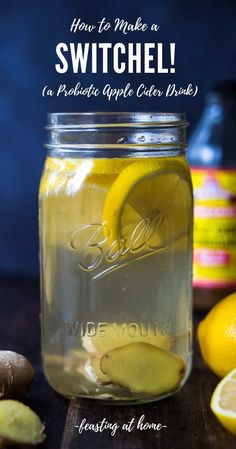 a mason jar filled with lemons and water