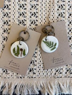 🌿 Real Botanical key rings.  100% all natural ferns, gathered and pressed on our farm in northern Pennsylvania.  After dried, I pressed the ferns into clay and sealed with an epoxy coating.  Hang these clay key rings on your lanyard, backpack or car to remind you of nature no matter where you are. Choose from fern and fiddlehead or single fern in the drop down box  These are a great gift to give to a new driver, a nurse for a lanyard, a teacher for a work bag, or a best friend...  Each one is a Northern Pennsylvania, Back To School Backpack, Back To School Backpacks, New Driver, Backpack Charm, Epoxy Coating, New Drivers, School Backpack, Work Bag