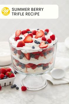 a trifle with strawberries, blueberries and raspberries in it