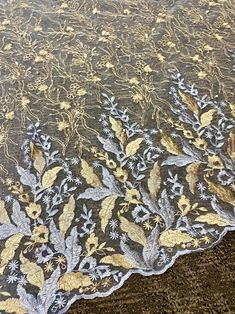 "This was a perfect find as it matched my daughter's wedding dress perfectly. (It was an Essence of Australia dress, and we used this fabric to add sleeves.)" Angela. Verified Kikitextiles Customer ✅ Luminescent and of an excellent quality, Kiki Textiles presents this gorgeous, embroidered lace on clear mesh. This medium-weight lace features an ornate, floral pattern that is very diverse compared to your typical floral lace fabric. An exceptionally beautiful lace for those times when you want yo Traditional Wedding Fabric With Lace Work, Wedding Embroidered Fabric With Multicolor Embroidery And Lace Work, Festive Wedding Fabric With Lace Work, Embroidered Fitted Fabric For Wedding, Stretch Lace Fabric, Essence Of Australia, Types Of Lace, Add Sleeves, Embroidered Leaves