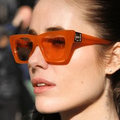 Enjoy the clarity of polarized lenses and the affordable luxury quality. From urban escapades to your next road trip, you won't want to leave home without them. The Uptown square sunglasses in orange are styled in a sleek apricot frame with soft amber lenses for a timeless, everyday look. Handcrafted bioacetate frames made from plant-based materials. Earth-friendly and Rx-ready, complete with polarized lenses for 100% UVA/UVB protection. Reinforced with optical-grade stainless steel hardware and Orange Lens Sunglasses, Classic Orange Sunglasses With Gradient Lenses, Summer Orange Anti-reflective Sunglasses, Rectangular Orange Sunglasses With Gradient Lenses, Orange Anti-reflective Sunglasses For Beach, Orange Plastic Sunglasses With Anti-reflective Coating, Mignonne Gavigan, Environmentally Conscious, Sunglasses & Glasses