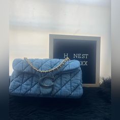 Denim And Nappa Leather Inside Zip And Magnetic Snap Pockets Pushlock Closure, Fabric Lining Outside Slip Pocket Chain Strap With 21 1/2" Drop For Shoulder Or Crossbody Wear 10 1/4" (L) X 5 1/2" (H) X 3 1/4" (W) Style No. Cr704 Chic Blue Denim Shoulder Bag, Designer Blue Denim Bags, Elegant Denim Shoulder Bag, Designer Denim Rectangular Shoulder Bag, Designer Denim Blue Denim Bags, Designer Blue Coach Shoulder Bag, Coach Denim Handbag, Luxury Rectangular Denim Shoulder Bag, Luxury Denim Rectangular Shoulder Bag