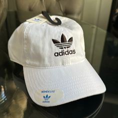 Brand New, Never Worn, White Womens Fit Hat Adidas Cotton Hats For Summer, Adidas Cotton Summer Hats, Adidas Casual Hat With Curved Brim, Adidas Casual Curved Brim Hat, Adidas Casual Summer Hats, Casual Adidas Hat With Curved Brim, Adidas Sporty Hats For Spring, Adidas Hats For Summer Streetwear, White Adjustable Dad Hat For Streetwear