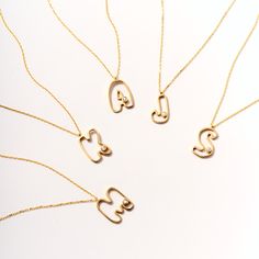 Elevate your style with our Diamond Cut-Out Initial Necklace for Women. Crafted from 14k Solid Gold, this unique cut-out initial pendant is personalized with exquisite diamonds, making it a perfect gift. Its unparalleled design and luxurious appeal enhance any outfit, making it a must-have accessory for every fashion-forward woman. This personalized diamond necklace not only adds a touch of sophistication to your look but also serves as a unique gift, perfect for any special occasion. 14K solid Formal Initial Pendant Necklace With Monogram, Luxury Initial Pendant Name Necklace As Gift, Luxury Initial Pendant Necklace For Gift, Luxury Diamond Initial Necklace For Gift, Luxury Diamond Initial Necklace As A Gift, Luxury Personalized Initial Pendant Necklace, Formal Monogram Initial Pendant Necklace, Luxury Personalized Initial Necklace For Anniversary, Personalized Luxury Initial Necklace For Anniversary