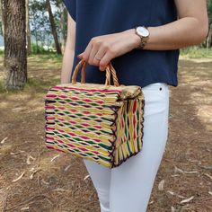 Straw Reed Handbag Artisan Made Made in Portugal Dimensions: L - 21 cm, W - 15 cm, H - 17 cm  L - 8,3 in, W - 5,9 in, H - 6,7 in The dimensions may vary slightly. Summer Rectangular Satchel For Daily Use, Rectangular Multicolor Bucket Bag For Summer, Rectangular Satchel With Handles For Vacation, Rectangular Satchel For Vacation, Multicolor Rectangular Bag For Summer, Rectangular Multicolor Bags For Summer, Casual Multicolor Square Straw Bag, Casual Rectangular Box Bag For Gift, Multicolor Rectangular Summer Bag