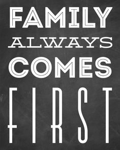 the words family always comes first written in white on a blackboard