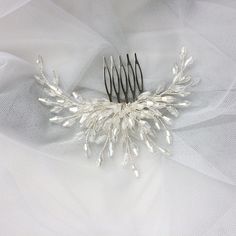 Bridal hair comb our new favorite crest crystal Hair Piece, absolutely stunning design, makes your hair look divine. Beautiful crystals of an interesting shape are collected on a silver jewelry wire. Bridal hairpiece very easy to use. Wedding headpiece you can attach both to the loose hair and to the assembled ones. If you like unusual crystal haircomb that attract attention, then I will be happy to decorate your hair with your silver comb handmade work. In our crystal bridal piece you will be i Simple Headpiece, Accessories Simple, Wedding Comb, Silver Head Piece, Floral Hair Combs, Crystal Hair Comb, Bridal Comb, Handmade Wire Jewelry, Hair Comb Wedding