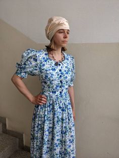 Loveliest Vintage austrian folk dress with the most delicate flower Print of Cornflowers, violets and pansies with a blue edging and the matching buttons. Lightest quality linen perfect for spring, summer, autumn to stroll the fields or walk along the coast. The Dirndl has beautiful puff sleeves. Suggested for size small but please compare measurements with a dress of yours. (Two little spots of repairment please see example picture but not really visible due to the print) Shoulder to shoulder:3 Blue Cotton Prairie Dress For Summer, Blue Prairie Dress For Summer, Blue Fitted Prairie Dress For Spring, Fitted Blue Prairie Dress For Spring, Vintage Blue Prairie Dress For Summer, Blue Vintage Prairie Dress For Summer, Fitted Summer Peasant Prairie Dress, Blue Flower Print, Folk Dress