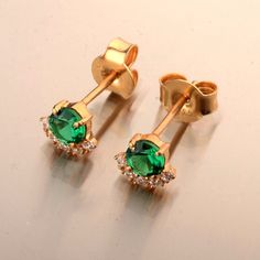 All Silver items will be shipped via standard shipping and will be delivered in 2 to 3 weeks after the shipment. All gold items will be shipped via express shipping and will be delivered in 5 to 10 days after the shipment. Half Halo Lab Grown Emerald and Diamond Studs, 14k Gold Emerald Earrings, Green Stone Earrings, Sterling Silver Stud Earrings, Everyday Stud  ❖ Details For Pair  ◽ Gemstone : Lab Grown Emerald/ Moissanite / Lab Grown Diamond ◽ Color : Colorless ◽ Clarity : VVS ◽ Stone Size : 5mm and 1.5mm Apporx.  ◽ Made to Order ◽ Gold Karat : 925 Sterling Silver, 10k / 14k / 18k Gold ◽ Available in Rose Gold, Yellow Gold, White Gold  ❖ Processing   All items in our shop are made to order, handmade, no stock with utmost care. Please allow up to 3-4 weeks for your piece to be crafted.  ❖ Green Cluster Earrings Gift, Green Cluster Earrings As A Gift, Gold Emerald Earrings, Green Stone Earrings, Gold Items, Silver Items, Earrings Everyday, Sterling Silver Stud Earrings, Earrings Green