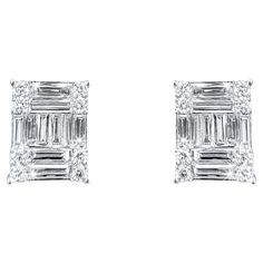 Earring Information Metal Purity : 18K Color : White Gold Gold Weight : 5.21g Diamond Count : 16 Round Diamonds Round Diamond Carat Weight : 0.47 ttcw Baguette Diamonds Count : 20 Baguette Diamonds Carat Weight : 1.93 ttcw Serial #EA18443 Lead Time : 4-8 Weeks (If out of Stock) JEWELRY CARE Over the course of time, body oil and skin products can collect on Jewelry and leave a residue which can occlude stones. To keep your Jewelry looking bright and new, take a soft headed toothbrush with some mi Baguette Diamond Earrings, Ringe Gold, Baguette Diamonds, Diamond Carat, Jewelry Diamond, Baguette Diamond, High Jewelry, Gold Gold, Body Oil