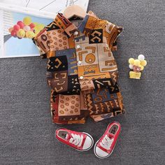 *Title: 2-piece Letter Pattern Short Sleeve Shirt & Shorts for Toddler Boy Children's Clothing*Ketword tag: wholesale children's boutique clothing suppliers* Season: Summer * Thickness: Regular * Package Include: 2 Pieces * Fabric: Cotton * Care Label: On the inside Multicolor Cartoon Print Sets For Spring, Spring Multicolor Cartoon Print Sets, Casual Cotton Patchwork Sets, Casual Brown Playwear Sets, Multicolor Cartoon Print Sets For Playwear, Sleeveless Cotton Cartoon Print Sets, Sleeveless Cotton Set With Cartoon Print, Brown Short Sleeve Sets For Summer, Brown Cotton Playwear Set