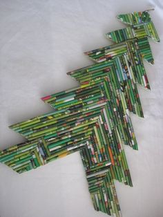 several pieces of paper are arranged in the shape of a christmas tree