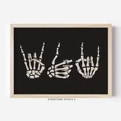 three skeleton hands are shown in black and white, with the words everyone prints on it