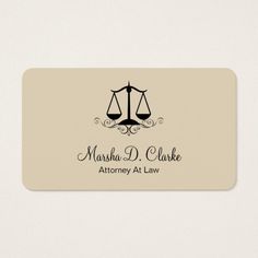 a business card with an image of a scale of justice on it