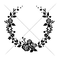 a black and white image of a wreath with roses on it, surrounded by leaves