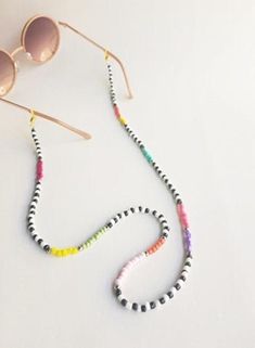 Check out this item in my Etsy shop https://www.etsy.com/listing/796739002/eyeglasses-chain-eyeglass-holder Trendy White Glasses Chains With Colorful Beads, White Glass Glasses Chains With Colorful Beads, Trendy White Glass Necklaces, White Glass Glasses Chains For Fashion Accessory, White Glass Fashion Accessory Glasses Chains, White Glass Glasses Chains, Trendy White Glass Necklace, Eyeglass Holder Necklace, Pulseras Kandi