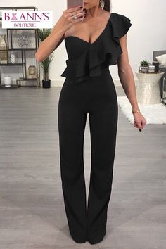 This sweet but sexy jumpsuit is absolutely perfect. Featuring a fitted top and waist to flare legs with one exposed shoulder and one ruffled shoulder that falls to the waist. This jumpsuit pairs perfectly withe wedges, heels or booties and statement jewelry. Made with a blend of polyester and spandex for comfort and style and comes in four fabulous colors from which to choose. One-shoulder Fitted Jumpsuit With Ruffles, Fitted One-shoulder Jumpsuit With Ruffles, Fitted One-shoulder Ruffled Jumpsuit, Fitted One-shoulder Jumpsuit For Spring, Flirty Sleeveless Jumpsuits And Rompers For Evening, Spring One Shoulder Ruffled Jumpsuits And Rompers, Flirty Sleeveless Jumpsuits For Evening, Flirty Sleeveless Evening Jumpsuits And Rompers, One-shoulder Ruffled Jumpsuits And Rompers For Spring