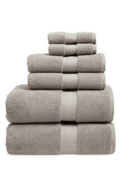 six towels stacked on top of each other