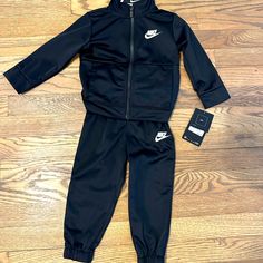 Brand New With Tags Nike Track Suit Outfit Color: Black Size: 18 Months Brand: Nike Casual Black Sports Sets, Casual Black Sets For Sports, Black Cotton Playwear Sets, Casual Black Playwear Sets, Black Winter Sports Sets, Black Cotton Playtime Sets, Nike Two Piece Outfit, Track Suit Outfit, Girls Nike Outfits