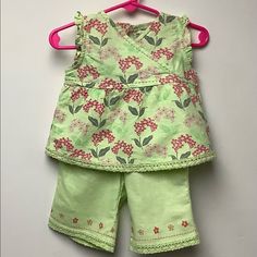 Pumpkin Patch Mint Green 2 Pc. Size 3-6m. Nwt. Top Is Greens & Pink Floral. Small Ruffle Over Sleeve Edged. Crisscross Bodice With Embroidered Pink Running Stitch. Leg Bottoms Have Printed Flowers And Pink Running Stitch. Top & Leg Hems Have Delicate Crocheted Edges. Fabric Is 55% Linen & 45% Cotton. From A Smoke Free Home. Cute Spring Play Sets, Playful Green Sleeveless Sets, Fitted Cotton Sets For Playtime, Pink Cotton Play Sets, Casual Play Sets For Spring, Green Cotton Playtime Sets, Green Cotton Sets For Playtime, Green Playful Sets For Spring, Cute Green Sets For Spring