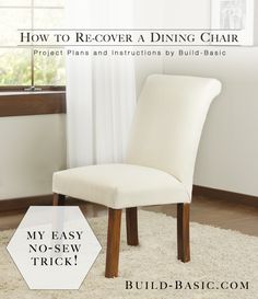 a white chair sitting on top of a rug next to a window