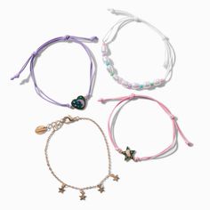 Expand your arm party to the galaxy with this celestial-inspired bracelet set. It includes three bolo-style bracelets with a star and heart-shaped mood charms that changes color with your mood and one chain with star charms. Pack Size: 4 Finish: Gold-tone Length: 6 in. + extender / 15.24 cm. + extender Closure: Lobster clasp, Bolo Material: Metal, Polyester - Claire's Gold Celestial Mood Bracelet Set - 4 Pack Adjustable Dainty Star Jewelry, Casual Star Charm Jewelry Gift, Casual Jewelry Gift With Star Charm, Casual Jewelry With Star Charm As Gift, Casual Jewelry With Star Charm For Gift, Casual Star Charm Jewelry, Trendy Bracelet With Sliding Knot, Casual Adjustable Chain Jewelry For Friendship, Trendy Sliding Knot Bracelet