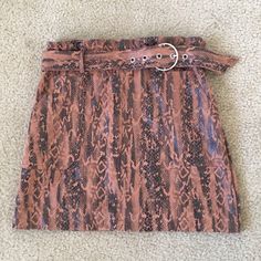 Sexy Haute Monde Brown And Black Animal Print Skirt Size Large. This Item Is Not Nwt, However It’s Only Been Worn A Few Times. It Comes With A Cute Adjustable Belt And Pockets. It Is 15.5” Wide And 17.5” Long. Please Feel Free To To Message Me With Any Questions And Happy Poshing Brown Stretch High Waist Mini Skirt, Brown High Waist Stretch Mini Skirt, Trendy Fitted Brown Mini Skirt, Brown Stretch Mini Length Bottoms, Stretch Brown Mini Length Bottoms, Brown High Waist Mini Skirt For Party, High Waist Brown Mini Skirt For Party, Trendy High Waist Brown Mini Skirt, Trendy Brown Mini Skirt