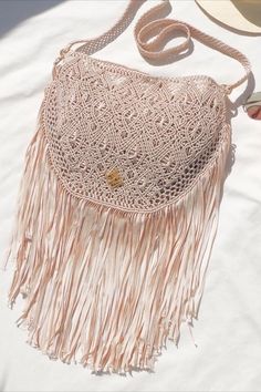 Macrame crossbody bag boho style. Handmade in Bolivia. Natural color Natural Color Crossbody Hobo Bag For Summer, Bohemian Hobo Bag With Adjustable Strap For Vacation, Bohemian Crochet Bag With Fringe For Travel, Bohemian Woven Bags For Summer, Bohemian Beige Woven Beach Bag, Bohemian Straw Bag With Adjustable Strap For Everyday Use, Summer Shoulder Bag With Tassels For Everyday, Handwoven Crossbody Shoulder Bag For The Beach, Everyday Summer Shoulder Bag With Tassels