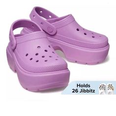 Step Out In Style With These Women's Crocs Stomp Clog Bubble Violet Purple Slip-On Slides. The Slip-On Closure Makes Them Easy To Wear, And The Rubber Upper Material Provides Durability For All-Day Use. These Shoes Are Perfect For Any Occasion, Whether You're Running Errands, Going Out With Friends, Or Working At The Office. The Violet Color And Solid Pattern Add A Touch Of Elegance To Your Outfit, While The Lightweight, Comfortable, And Breathable Features Make Them Ideal For Walking, The Beach Trendy Non-slip Clogs With Round Toe, Synthetic Clogs With Thick Bottom And Round Toe, Trendy Non-slip Round Toe Clogs, Purple Slip-on Clogs For Summer, Trendy Non-slip Closed Toe Clogs, Purple Closed Toe Clogs For Summer, Casual Synthetic Clogs With Chunky Platform, Summer Purple Closed Toe Clogs, Casual Purple Clogs For Summer