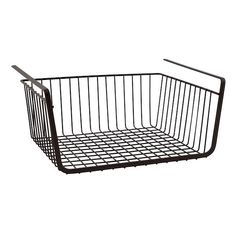 a black wire basket is shown on a white background, with the handle extended to it's left side