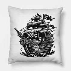 a black and white pillow with a pirate ship on it