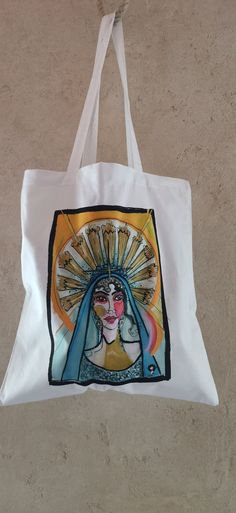 TOTE BAG ILLUSTRATRION ORIGINAL, DIVAS theme, spiritual inspiration, sacred woman, Madonna, spirituality 100% white cotton canvas bag TISSU 150g/m2 STANDARD 100 OEKO-TEX Dimensions 42X37 cm with large handles 70 cm 10L capacity Sending neat protective pouch. White Artistic Canvas Bag For Everyday, Artistic White Canvas Bag For Everyday, Hand Painted White Cotton Canvas Bag, Artistic White Rectangular Canvas Bag, Artistic White Canvas Tote Bag, Hand Painted White Canvas Tote Bag, White Hand Painted Canvas Tote Bag, White Artsy Tote Bag, Artistic White Cotton Canvas Bag