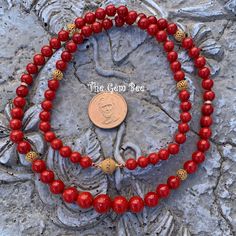 DESCRIPTION: Thank you for coming in! Beautiful rare Mediterranean Sardinia Coral with OX blood red color and sphere shape! The color is directly from the ocean, not dyed! 100% natural beauty! 28 inch necklace with 18k solid gold diamond spacers and clasp! Manufactured in Italy! 327 carats! You'll get the necklace you see! SIZE of the coral : Appr.7.5mm-11.5mm COLOR: OX Blood Red GRADE: AA Blood Red Color, Natural Coral, Sky Blue Topaz, Blood Red, Sardinia, Red Coral, Wow Products, Ox, Spring Rings