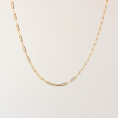 D E T A I L S • Single Paperclip Chain of choice (dainty or medium link)• 18k Gold Filled• Dainty Link Chain Length: 18" + 1" extender • Dainty Link Chain Width: 2mm• Medium Link Chain Length: 16" + 1" extender• Medium Link Chain Width: 4mm M A T E R I A L S •Our Gold filled jewelry has an outer layer of 14k or 18k gold that is pressure bonded to a base metal of jewelers brass. •This type of jewelry is made for everyday use of stacking or layering. • Jewelry can withstand normal body sweat, body Simple Everyday Paperclip Chain Necklace, Minimalist Gold Paperclip Chain Necklace, Minimalist Yellow Gold Paperclip Chain Necklace, Simple Gold Paperclip Chain Necklace, Simple Gold Necklace With Paperclip Chain, Delicate Everyday Paperclip Chain Necklace, Minimalist Paperclip Chain Necklace, Layering Jewelry, Body Sweat