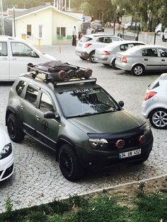 several cars are parked in a parking lot