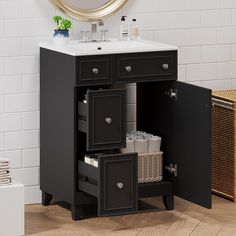 a bathroom vanity with two drawers and a mirror on the wall above it is shown