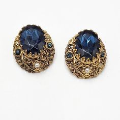 Vintage W. Germany Deep Blue Glass Faux Pearl Gold Tone Filigree Clip Earrings. Lovely Layered Earrings! In Great Condition. Has Minor Signs Of Wear. Please See Pictures For More Details. Elegant Blue Clip-on Earrings For Formal Occasions, Elegant Formal Blue Clip-on Earrings, Elegant Blue Formal Clip-on Earrings, Vintage Blue Clip-on Earrings For Evening, Blue Vintage Clip-on Earrings For Evening, Blue Clip-on Earrings For Evening, Ornate Blue Earrings For Formal Events, Ornate Blue Earrings For Formal Occasions, Blue Oval Earrings For Evening