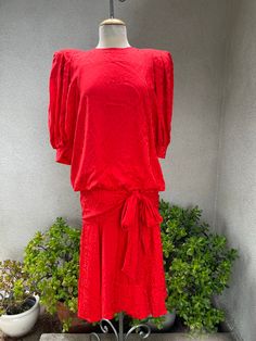 "Vintage 80s Dynasty style red hot silk dress big shoulders Sz 6 by Argenti. Made in Hong Kong, good condition. Tie at hips and button back. Measurements Shoulders with pads 18\" Puffy sleeves 13\" Bust waist hips 40\" Length 45\" Bodice length 24\"" Vintage Puff Sleeve Midi Dress For Party, Vintage Red Midi Dress For Evening, Red Vintage Dress For Date Night, Vintage Red Dress For Night Out, Red Vintage Dress For Night Out, Red Silk Dress, Big Shoulders, Puffy Sleeves, Red Silk