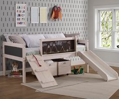 a child's bedroom with a slide and bed