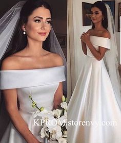 a woman in a wedding dress standing next to a bride wearing a white gown and veil