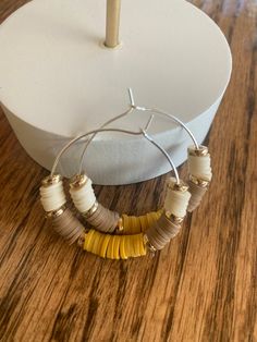 Silver 🌿Bohemian Style Hoops Creating handmade unique meaningful jewelry pieces designed to inspire you! Visit my shop https://Create2inspireOne.Etsy.com  🌟Details & Material:  *Silver Hoop Earrings  *Heishi Clay Beads mixed: beige, tan & mustard  *Gold flat focal beads *Earring Card included  *Silicone Backs included  *Jewelry Box Included  Create2inspireOne jewelry makes for a special occasion, great birthday gift, a friend, loved one,  anniversary gift- the shock on your partners face when Bohemian Single Beaded Earring For Everyday Wear, Yellow Small Hoop Jewelry For Everyday, Everyday Small Hoop Yellow Jewelry, Bohemian Hoop Wrap Earrings, Bohemian Small Hoop Earrings For Beach, Everyday Small Yellow Hoop Jewelry, Adjustable Hoop Earrings For Beach, Bohemian Hoop Wrap Earrings For Gift, Adjustable Hoop Earrings For The Beach