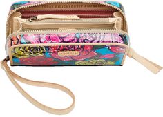 This accessory is functional for everyday use on its own or great for organization inside a larger bag. The Wristlet Wallet expands when unzipped to allow ample space for card organization and can be held by the included wristlet strap. -Multicolor Rosita ConsuelaCloth™ exterior -12 card slots, gusseted compartments, zipper pocket, and 2 open pocket compartments -Natural leather trim -8" (W) x 4 ½” (H) x 1 ¾” (D) 5 ½” drop -Made in Mexico Card Organization, Card Organizer, Baby Easter, Wristlet Wallet, Large Bag, Baby Romper, Leather Trim, Natural Leather, New Friends