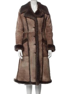 Discover timeless elegance with the Penny Lane Coat for women, a luxurious fur coat that combines vintage charm and modern style. This brown shearling coat features genuine wool construction and a cozy shearling lining, offering both warmth and comfort. Embrace the boho hippie aesthetic with this vintage 70s long coat, inspired by classic Afghan coat designs. The sophisticated trench coat silhouette and bohemian details make it a standout piece for any wardrobe. Perfect for those who love retro Shearling Long Fur Coat For Cold Weather, Long Shearling Fur Coat For Cold Weather, Shearling Long Coat For Cold Weather, Classic Sheepskin Coat With Faux Fur Trim, Classic Sheepskin Fur Coat With Faux Fur Trim, Elegant Shearling Fur Coat For Cold Weather, Elegant Mink Shearling Fur Coat, Classic Long Sheepskin Fur Coat, Elegant Brown Fur Coat For Cold Weather