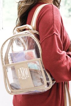 Whether you're headed to class, or the tailgate, this Clear Backpack Purse offers a chic and practical way to carry your essentials. Crafted from durable, transparent material, this versatile bag is perfect for stadium events, concerts, or everyday outings. With adjustable straps and multiple compartments, it combines style and functionality in one sleek design. Clear Backpack, Marley Lilly, Transparent Material, Backpack Purse, Sleek Design, Adjustable Straps, Sleek, Monogram, Purse