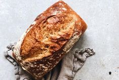 a loaf of bread sitting on top of a cloth