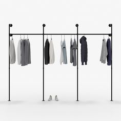 Retail store wall display systems Pipe Closet, Industrial Clothes Rail, Industrial Clothing Rack, Pipe Clothes Rack, Hanging Clothes Rail, Industrial Loft Design, Industrial Clothing, Heavy Clothing, Wardrobe Systems