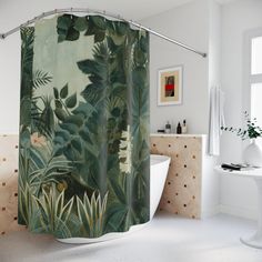 a bathroom with a black shower curtain that has green leaves on it and gold accents