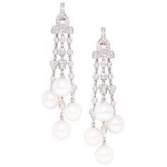 The diamond and pearl chandelier earrings feature a cascade with 8 South Sea pearls of 11mm diameter. The untreated South Sea pearls originate from the waters of Northwestern Australia. They display a beautiful nacre and their natural color and high luster have not been enhanced in any way. The design is complete with 4.94 carat of diamonds of different cuts (round, marquise, square) of top quality (color, clarity and cut, F-G/VVS). The earrings are one-of-a-kind and entirely handmade in 18 cara Tassel Chandelier, Graff Diamonds, Fine Pearl Jewelry, Pearl Chandelier Earrings, Diamond Chandelier Earrings, Diamond Chandelier, Pearl Chandelier, Gold Chandelier Earrings, Earrings Chandelier